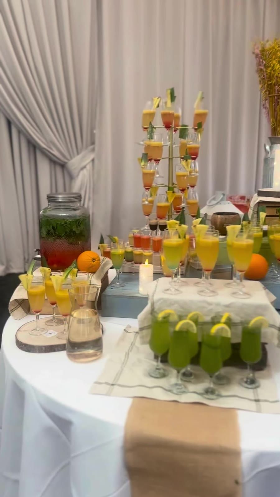 A tower of colourful mocktails at a Calvary event