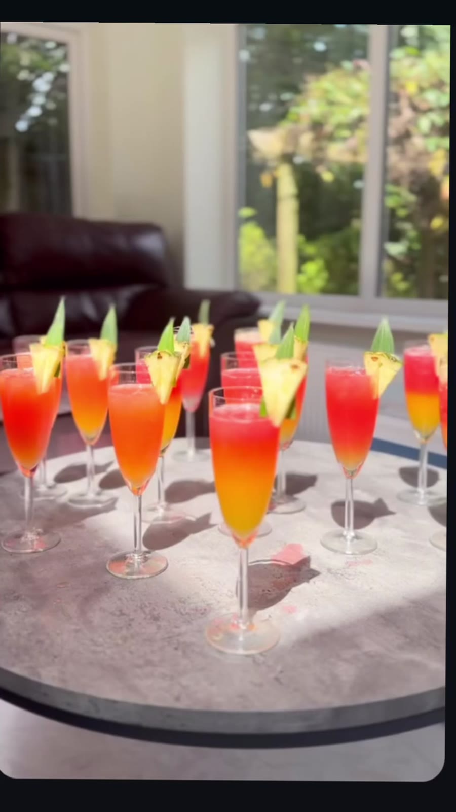A tray of layered fruit mocktails